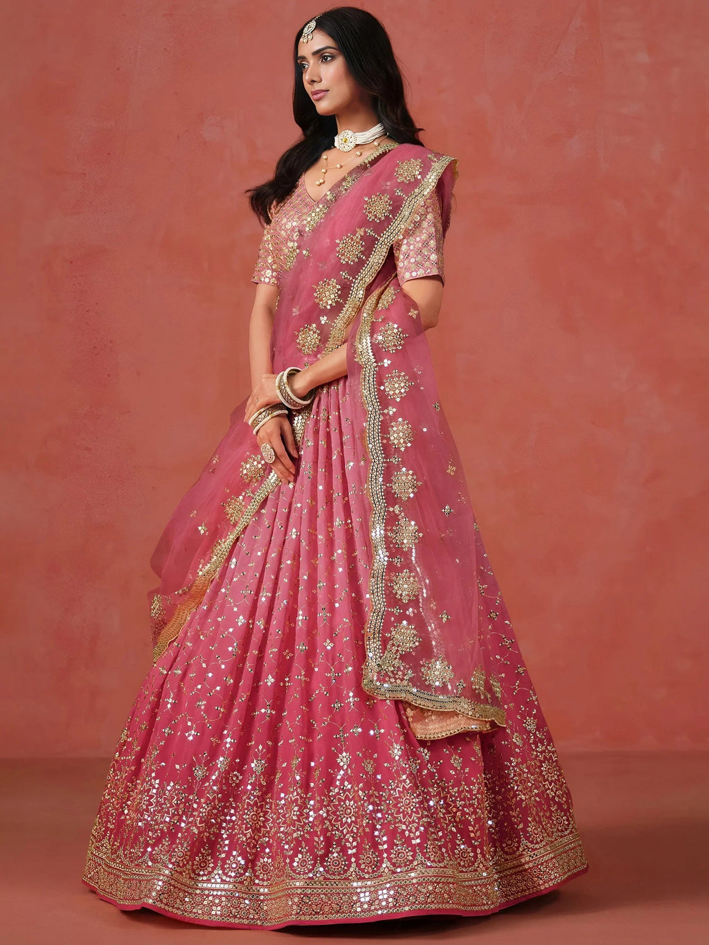 Stunning Peach Georgette Sequins Lehenga Choli