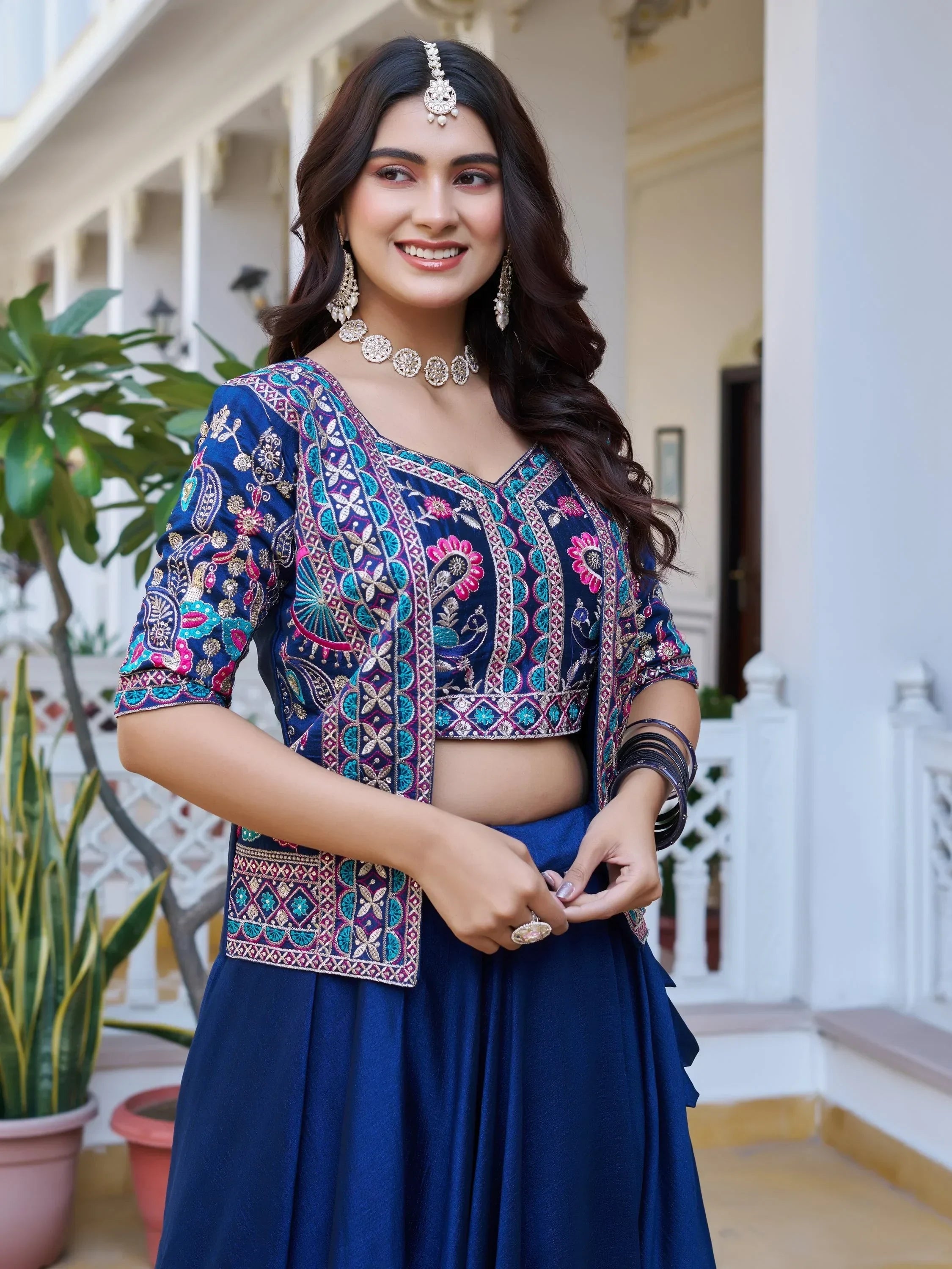 Lovely Blue Embroidered Silk Wedding Wear Lehenga Choli With Jacket