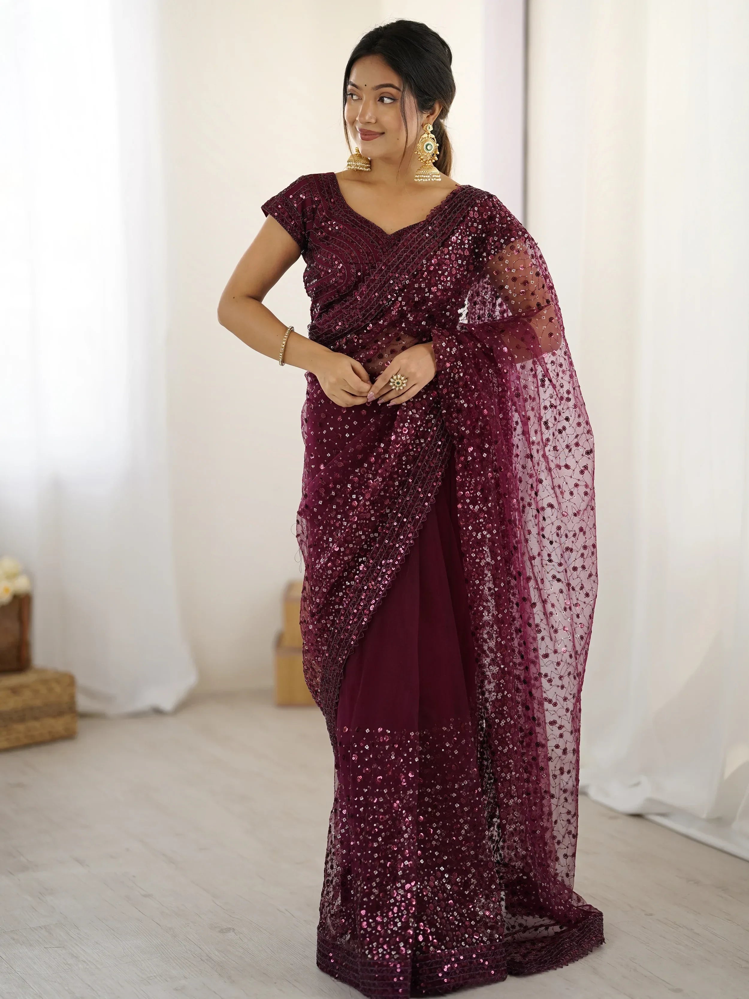 Glamourous Wine Sequins Net Festival Wear Saree With Blouse
