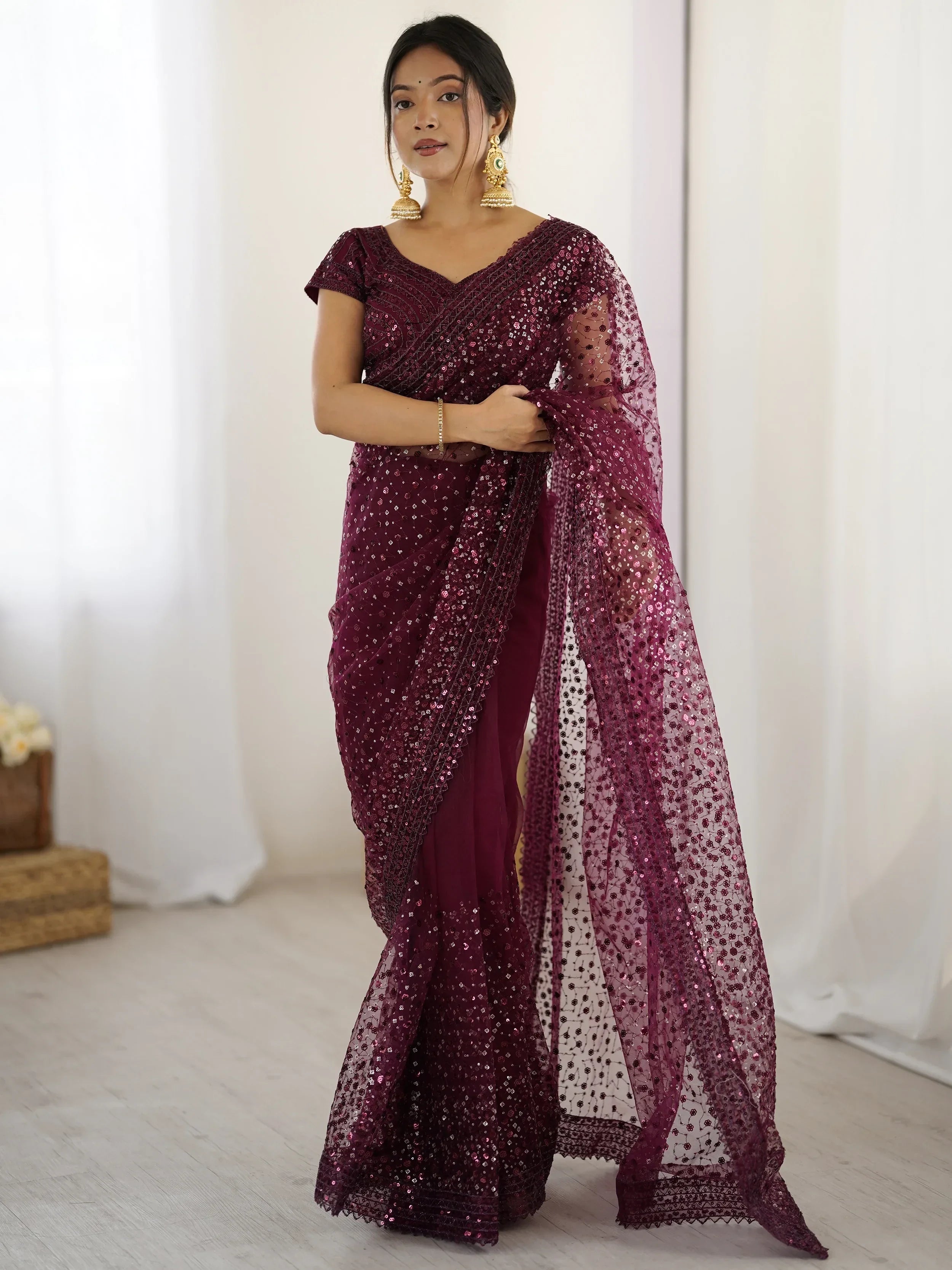 Glamourous Wine Sequins Net Festival Wear Saree With Blouse
