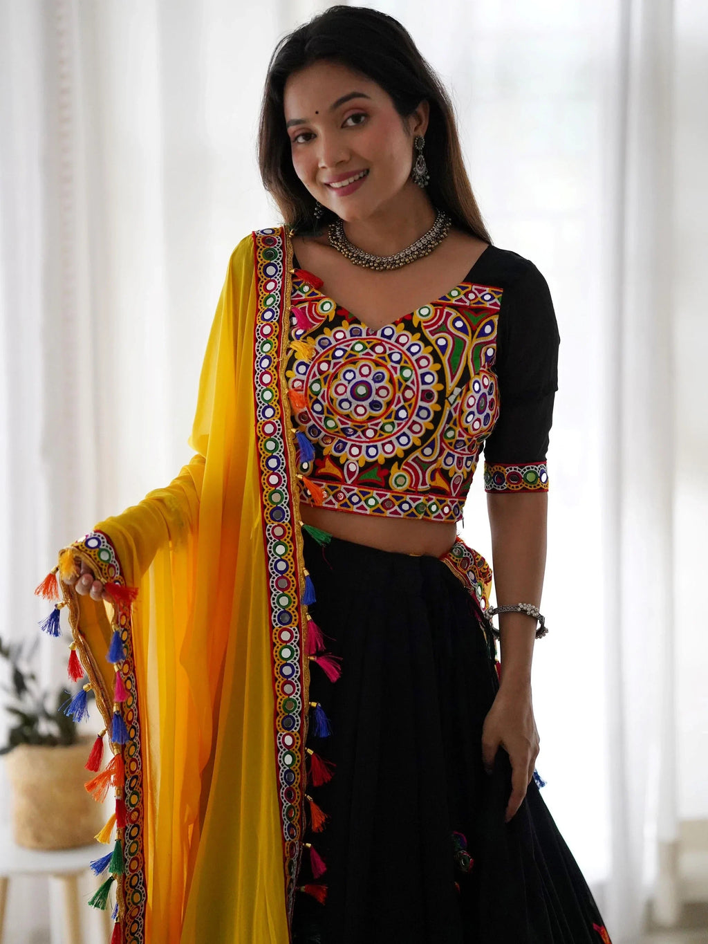 Impressive Black Georgette Mirror Work Navratri Wear Lehenga Choli