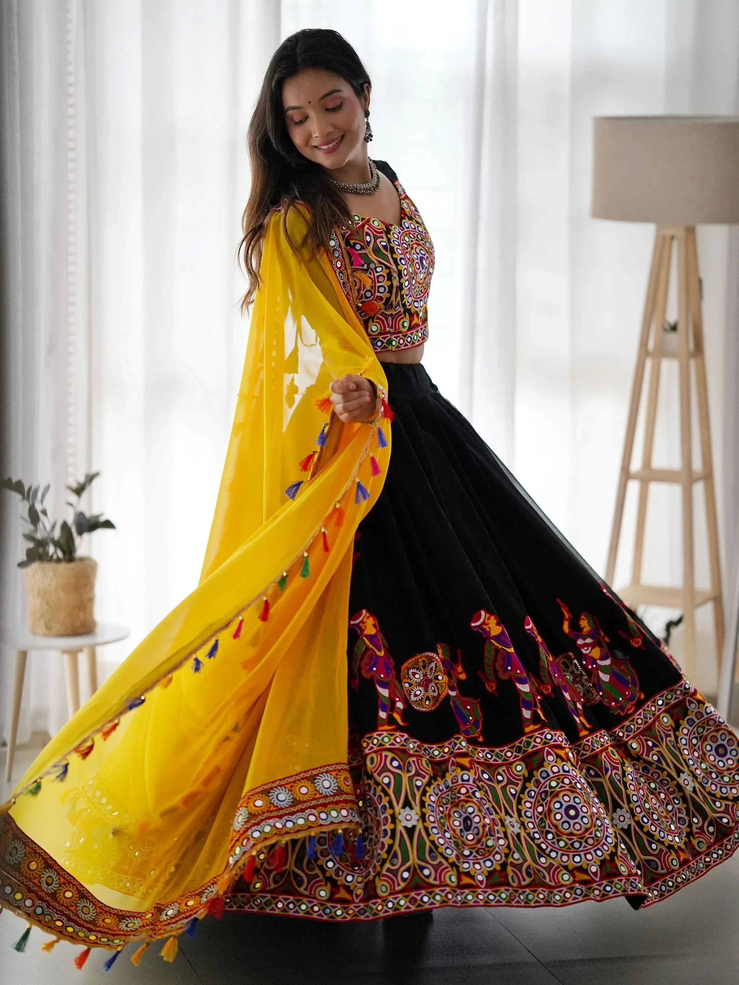 Impressive Black Georgette Mirror Work Navratri Wear Lehenga Choli