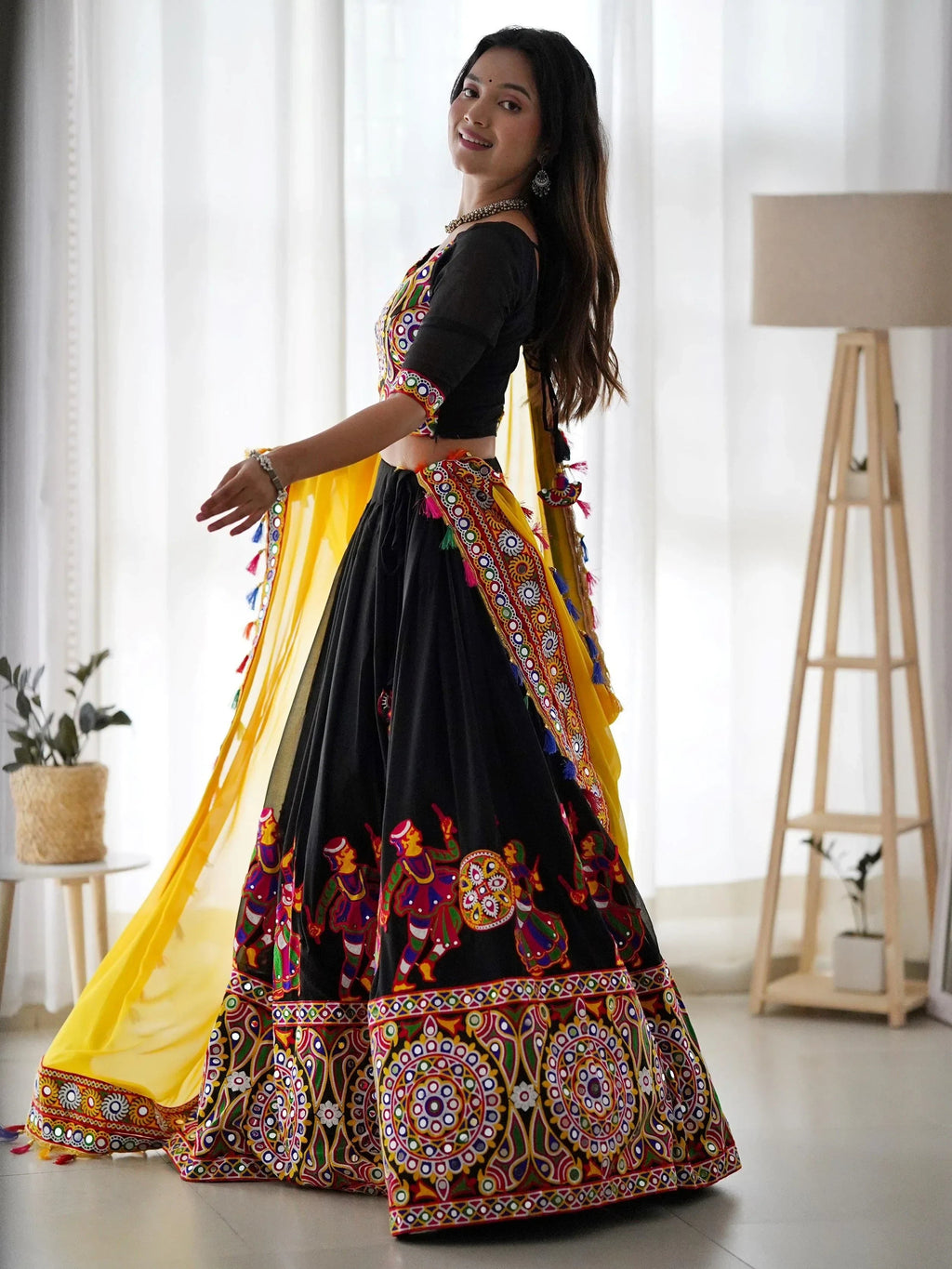 Impressive Black Georgette Mirror Work Navratri Wear Lehenga Choli
