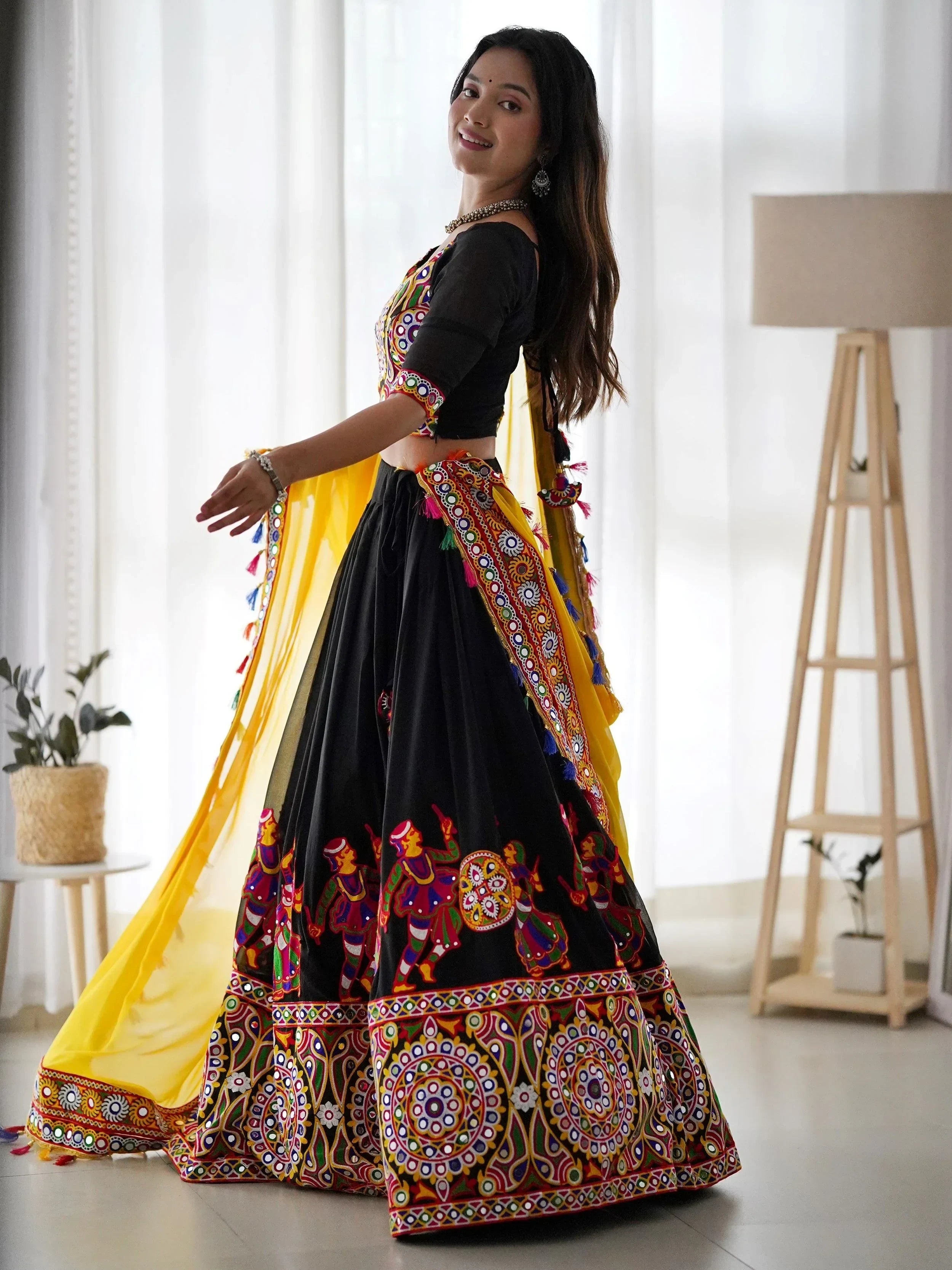 Impressive Black Georgette Mirror Work Navratri Wear Lehenga Choli
