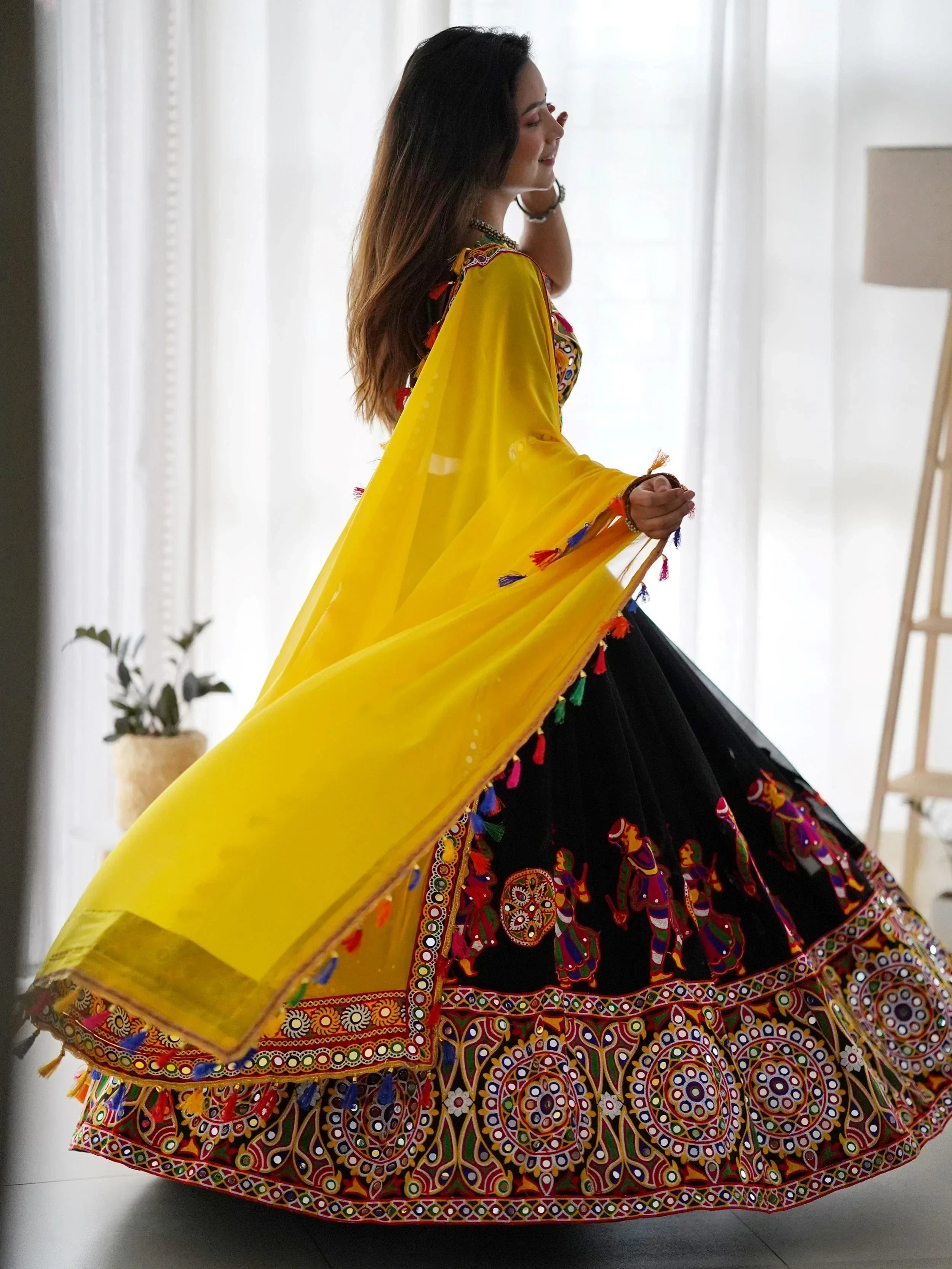 Impressive Black Georgette Mirror Work Navratri Wear Lehenga Choli