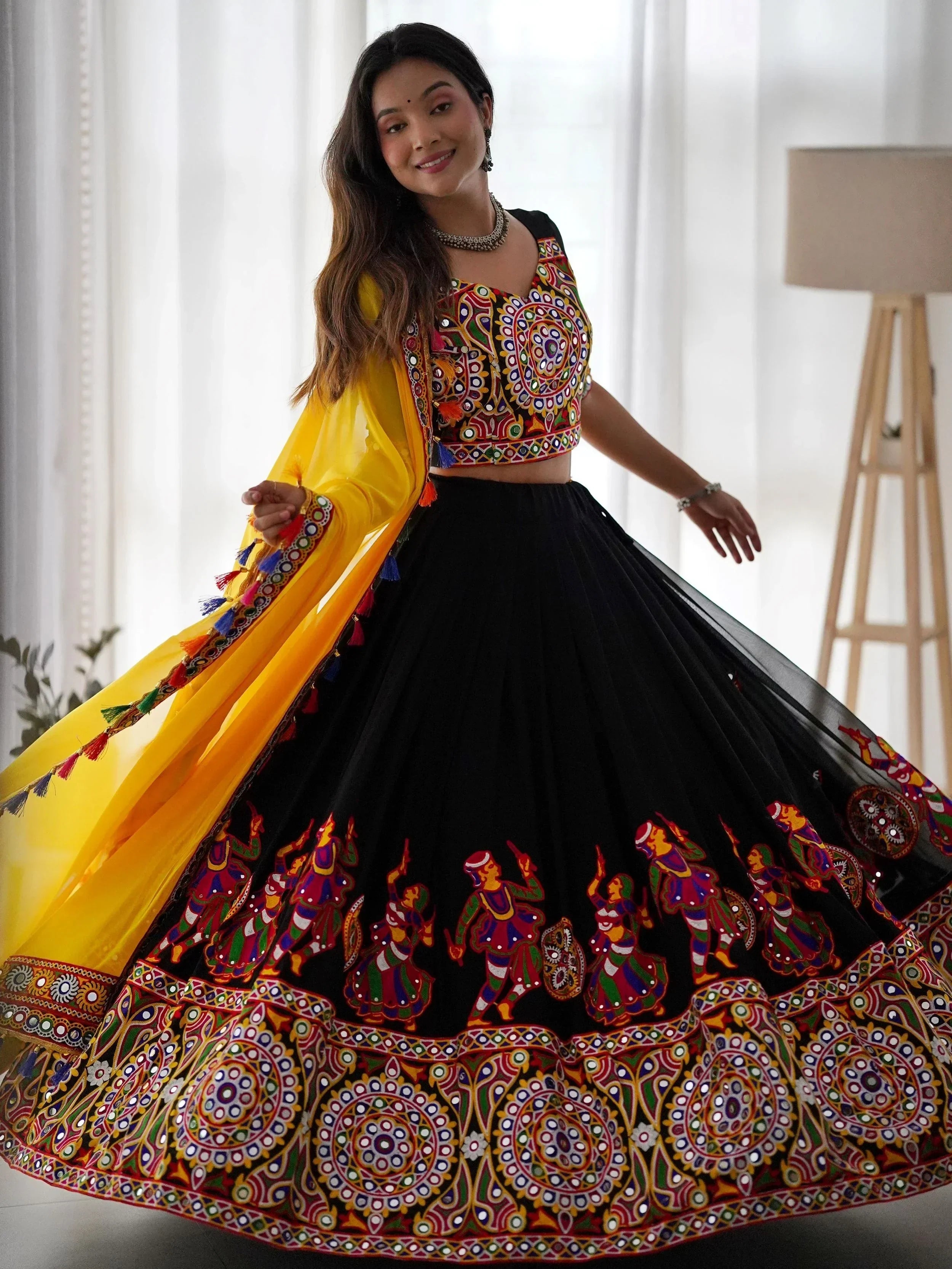 Impressive Black Georgette Mirror Work Navratri Wear Lehenga Choli