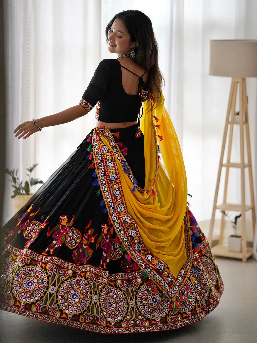 Impressive Black Georgette Mirror Work Navratri Wear Lehenga Choli